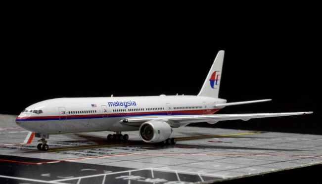 马来西亚政府宣布恢复MH370失事航班搜索工作